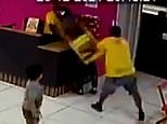 Moment Ice Cream Parlour Worker Floors Armed Robber With A Chair In